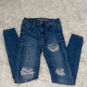 American eagle super stretch skinny blue ripped jeans